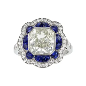 Platinum Brilliant Diamond and Blue Sapphire Halo Ring