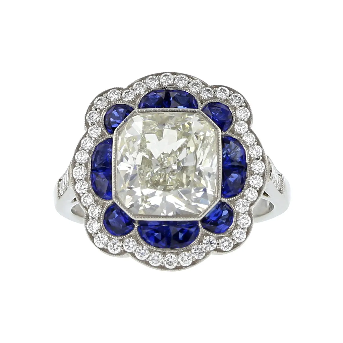 Platinum Brilliant Diamond and Blue Sapphire Halo Ring